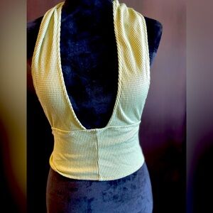 Green halter neck tie up crop top